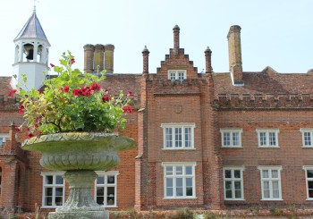 A view of Helmingham Hall from one of the gardens